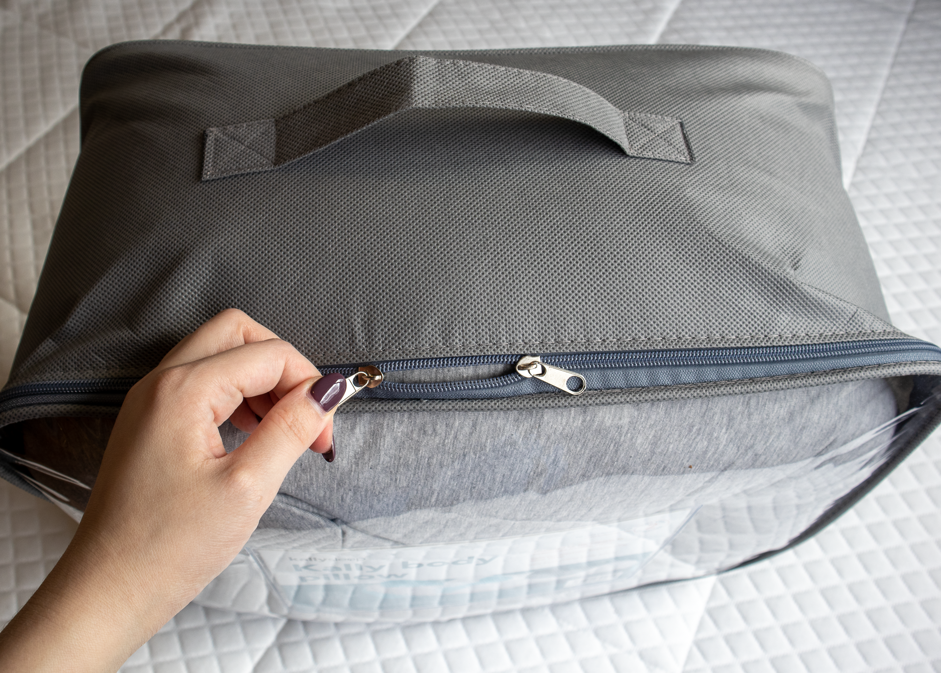 unzipping kally body pillow bag